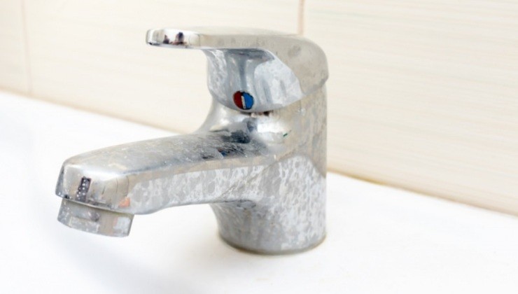 Bathroom faucet with limescale